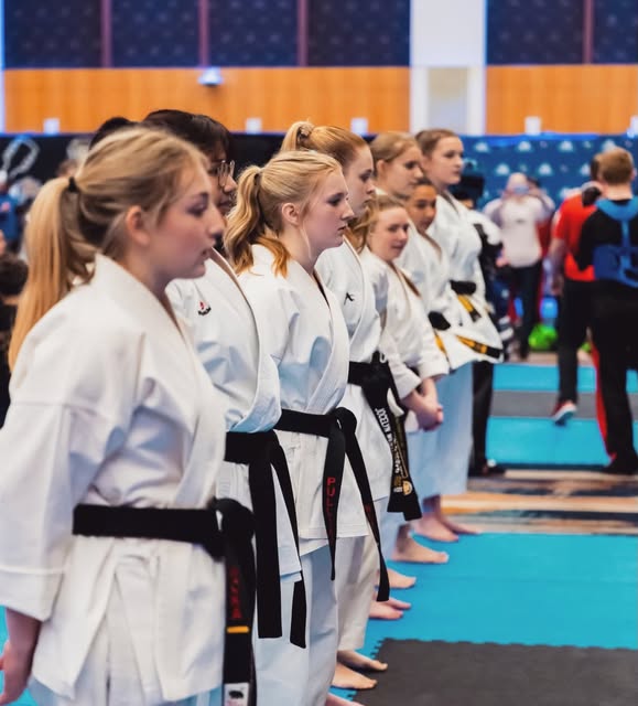 Athletes lined up at the Memphis Open in NASKA’s community photo, photographed by 5th Monday Studios